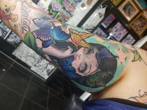 Explore black heart heart tattoo cover up ideas, creative tattoo ideas in Albuquerque, available at Por Vida Tattoo