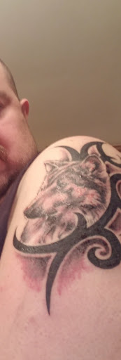 Explore matching husband and wife tattoo ideas, creative tattoo ideas in Midland, available at Black Ball Tattoo