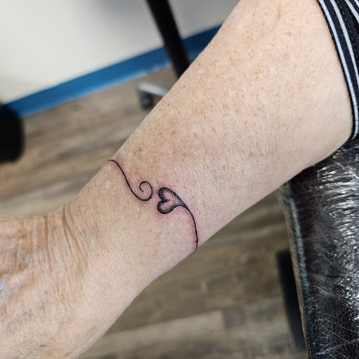 Explore semicolon tattoo ideas, creative tattoo ideas in Traverse City, available at Pinups & Needles