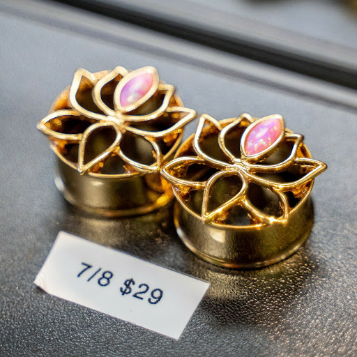 Explore tattoo ideas for women on shoulder, creative tattoo ideas in Summerville, available at Exotic Impressions Body Piercing