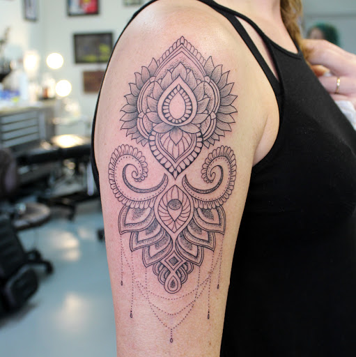 Explore boo tattoo ideas, creative tattoo ideas in Fort Myers, available at Tiger Lotus Tattoo and Piercing