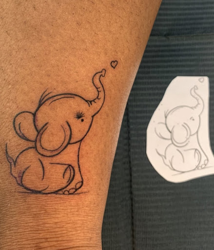 Explore floral tattoo cover up ideas, creative tattoo ideas in Baltimore, available at Rippd Canvas Tattoo Shop Artists Social Club