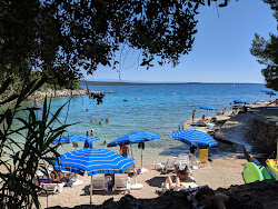 Galboka beach'in fotoğrafı küçük bir koy ile birlikte