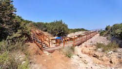 Photo de La Dolce Vita Beach entouré de montagnes