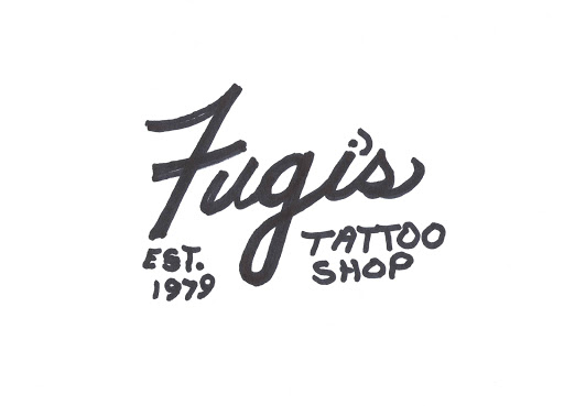 Explore tattoo ideas in french, creative tattoo ideas in Longview, available at Fugis Tattoo Shop