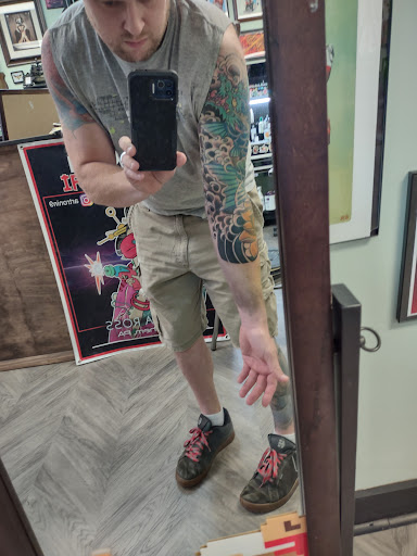 Explore sunflower and roses tattoo ideas, creative tattoo ideas in Bethlehem, available at Raygun Samurai Tattoo