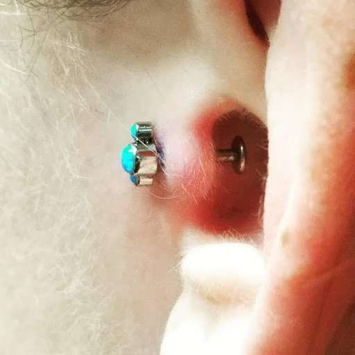 Explore tattoo ideas for father and son, creative tattoo ideas in Chapel Hill, available at Golden Falcon Tattoo and Piercing