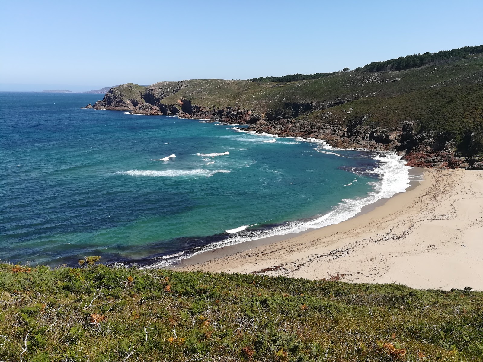 Foto van Arnela beach met hoog niveau van netheid