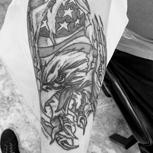 Explore back hand tattoo ideas, creative tattoo ideas in Seymour, available at American Gypsy Tattoo Corp.