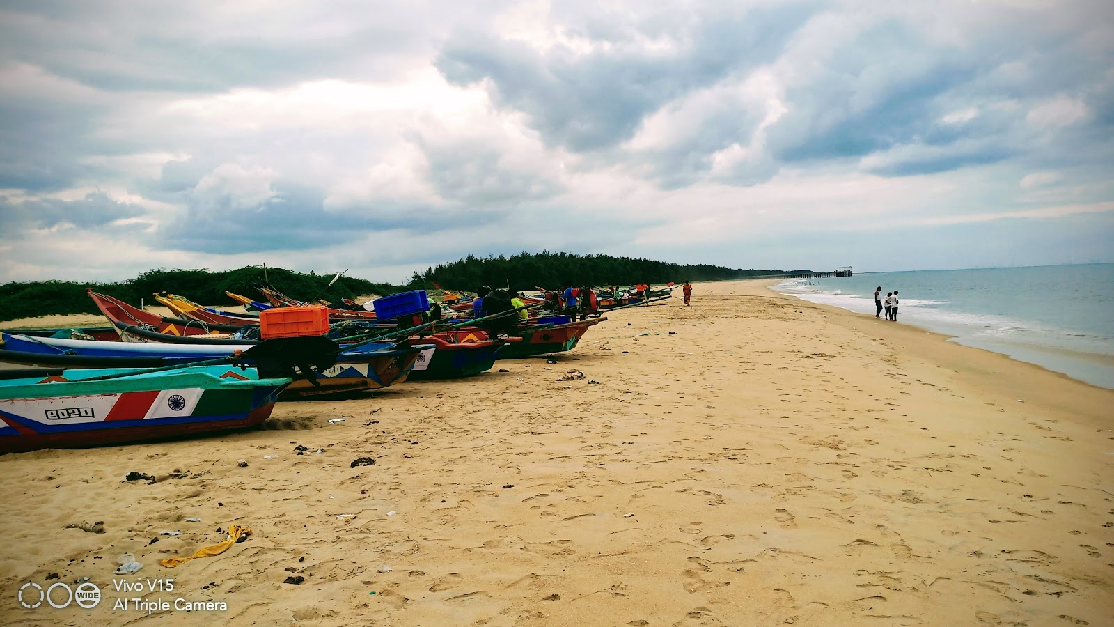 Foto av Tupilipalem Beach med lång rak strand