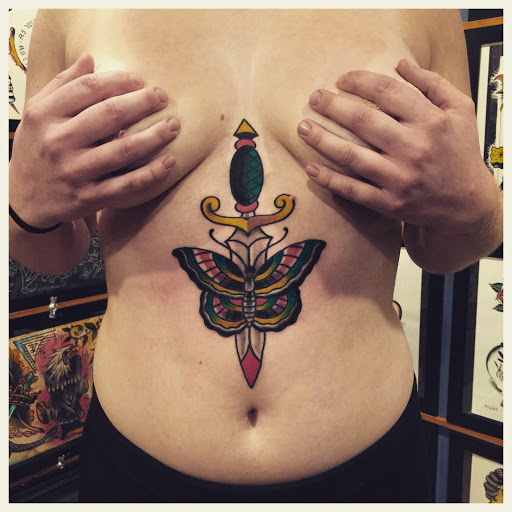 Explore tattoo ideas of lions, creative tattoo ideas in Warrenville, available at NoodlesTattoo Co. & Studio