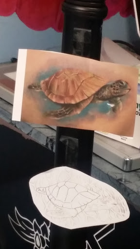 Tattoo Shop «Raining Ink», reviews and photos, 420 W 7th St, Columbia, TN 38401, USA