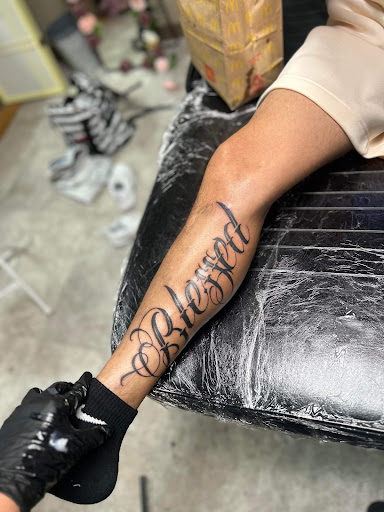 Explore postage stamp tattoo ideas, creative tattoo ideas in Kansas City, available at La plaza tattoo and art gallery