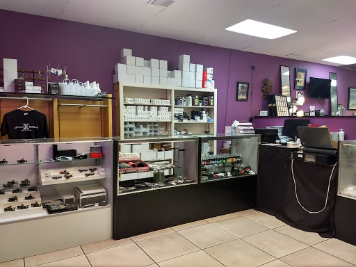 Tattoo Shop «Planet X Tattoo & Supply», reviews and photos, 3095 S Peoria St, Aurora, CO 80014, USA
