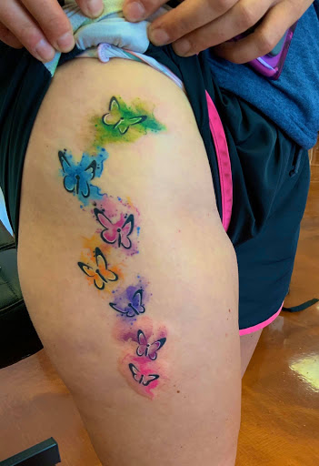 Explore sun tattoo ideas for men, creative tattoo ideas in Aledo, available at Elevated Tattoo & Piercing