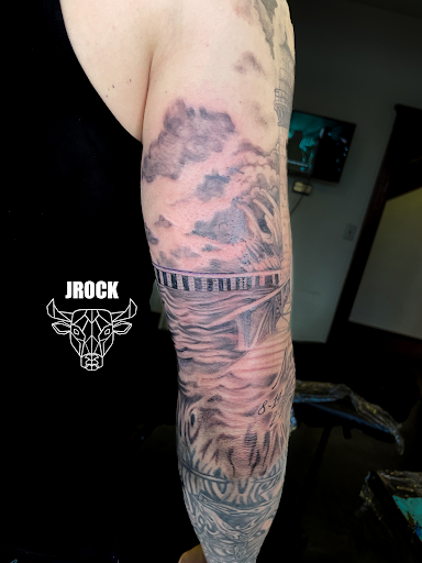 Explore daisy tattoo ideas, creative tattoo ideas in Jacksonville, available at Oxford Ink Tattoo