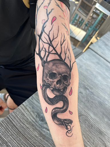 Explore resilience symbol tattoo ideas, creative tattoo ideas in Orlando, available at Hart & Huntington Tattoo Co. Orlando