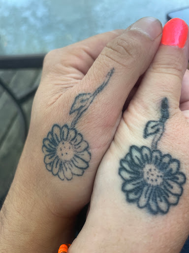 Find tattoo necklace ideas for your next unique tattoo in Bradley at Rogers Tattooing & Body Piercing