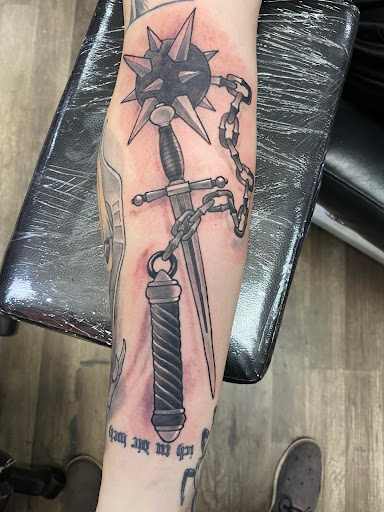 Explore tattoo name cover up ideas, creative tattoo ideas in Largo, available at Alchemy Tattoos and Body Piercings