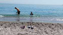 Photo de Playa de San Nicolas avec plusieurs baies longues
