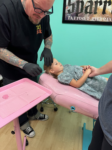 Explore behind the ear tattoo ideas, creative tattoo ideas in Magnolia, available at Lucky Sparrow Tattoo Shop and Piercing