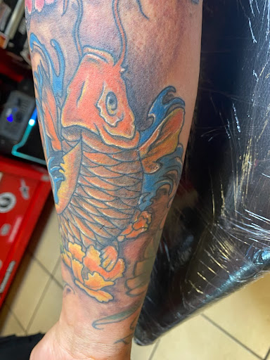 Explore small shoulder tattoo ideas, creative tattoo ideas in East Providence, available at Ink Therapy
