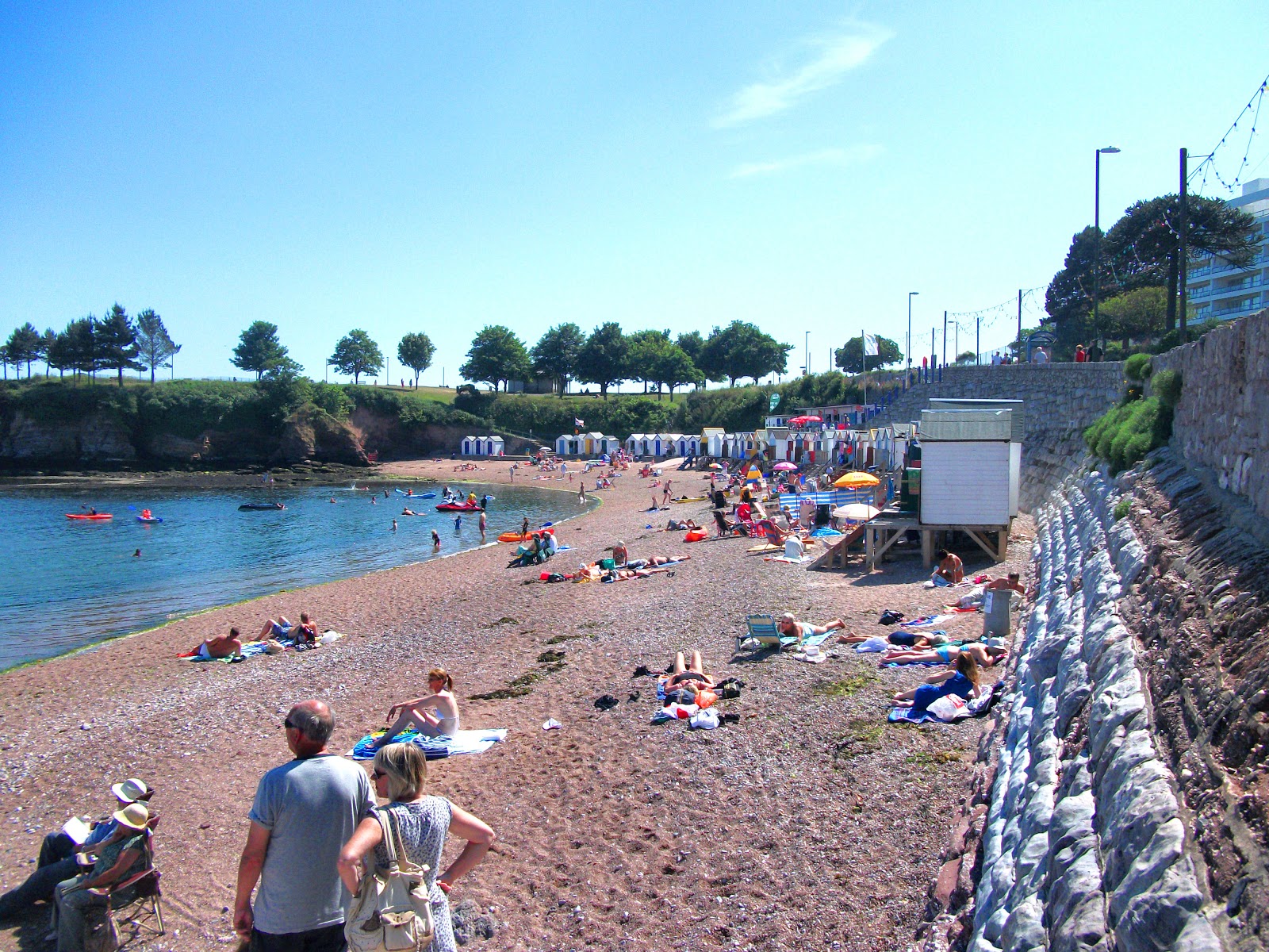 Foto van Corbyn beach met turquoise puur water oppervlakte