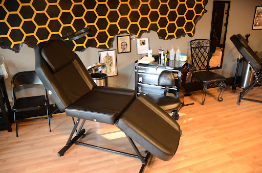 Explore cosmetology tattoo ideas, creative tattoo ideas in Omaha, available at Collective Hive Tattoo