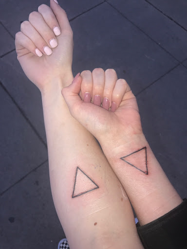 Explore ripped skin tattoo ideas, creative tattoo ideas in Fresno, available at Resistance Tattoo