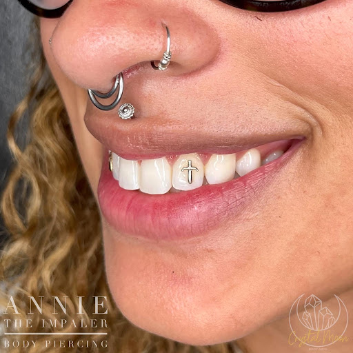 Explore strength tattoo ideas for females, creative tattoo ideas in Bloomington, available at Crystal Moon Body Arts