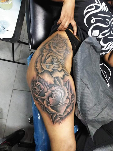 Explore butterfly foot tattoo ideas, creative tattoo ideas in Detroit, available at Motown Tattoo Company