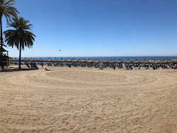 Foto von Playa de Venus und die siedlung
