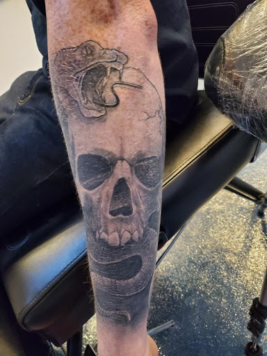 Explore tattoo ideas for numbers, creative tattoo ideas in Windsor Locks, available at Reigning Ink Tattoo Studio