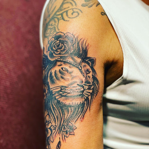 Explore tattoo ideas on the thigh, creative tattoo ideas in Jacksonville, available at Renegade Art Studio LLC