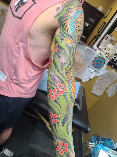 Explore memorial tattoo ideas for guys, creative tattoo ideas in Charleston, available at Broken Lantern Tattoo