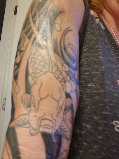 Explore daddy and son tattoo ideas, creative tattoo ideas in Myrtle Beach, available at Pitbull Tattoo and Piercing Clinic