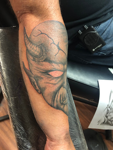 Explore year 2000 tattoo ideas, creative tattoo ideas in Alamosa, available at The Shop Tattoo & Comics