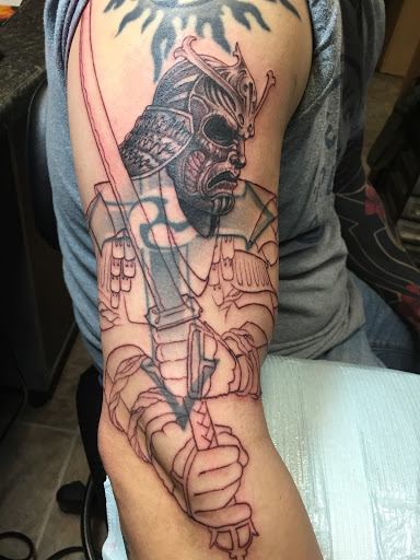 Explore metal tattoo ideas, creative tattoo ideas in Wilmington, available at Wildcard Studios