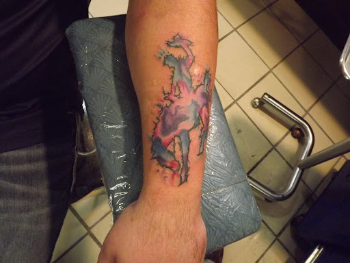 Explore hiking tattoo ideas, creative tattoo ideas in Princeton, available at Custom Dreams Tattooing and Body Piercing