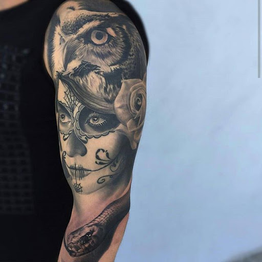 Explore skull rose tattoo ideas, creative tattoo ideas in Miami, available at INKAHOLIK TATTOOS