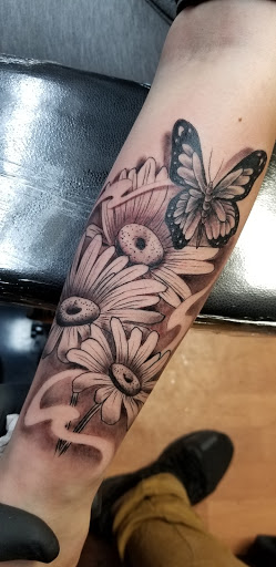 Explore simple neck tattoo ideas, creative tattoo ideas in Bronx, available at Tattoo Society Studio