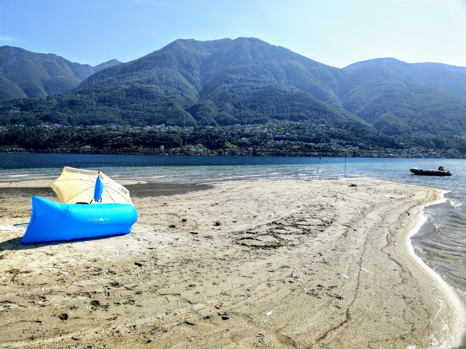 Photo of Locarno spiaggia with bright sand surface