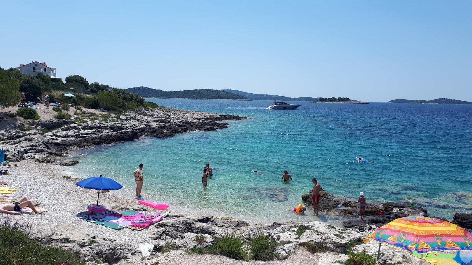 Photo of Zecevo beach with turquoise pure water surface