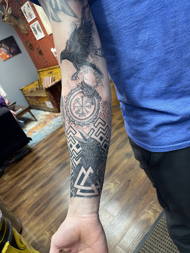 Explore tulip tattoo ideas, creative tattoo ideas in Des Moines, available at Skin Kitchen Tattoo