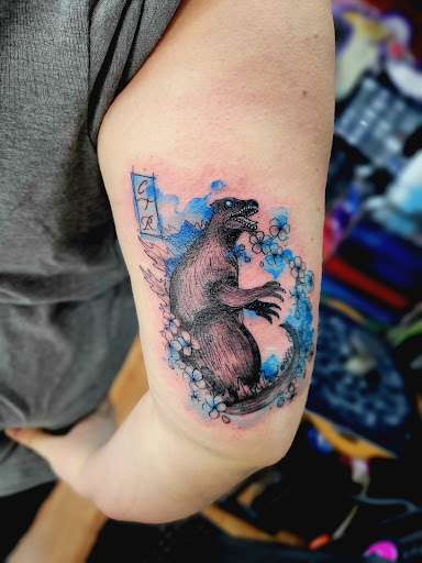 Explore tattoo ideas for women side, creative tattoo ideas in Benton, available at Spectrum Tattoo