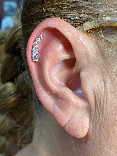 Explore family tree tattoo idea, creative tattoo ideas in Corcoran, available at La Raza Tattoo 2