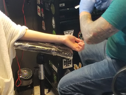 Explore gun tattoo ideas, creative tattoo ideas in Myrtle Beach, available at Elite Ink Tattoos of Myrtle Beach