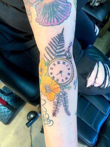 Explore cross with names tattoo ideas, creative tattoo ideas in Lincoln City, available at Black N Blue Tattoo & Skate Shop