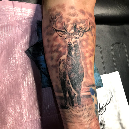 Find tattoos ideas for mothers for your next unique tattoo in Monticello at 850 Tattoo Co.