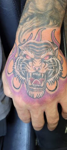 Explore 90's cartoon tattoo ideas, creative tattoo ideas in Angola, available at Hoodlum Ink